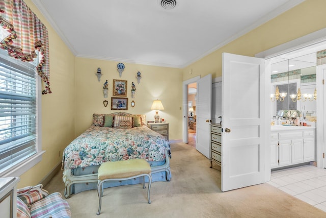 carpeted bedroom featuring ensuite bath, crown molding, and an inviting chandelier