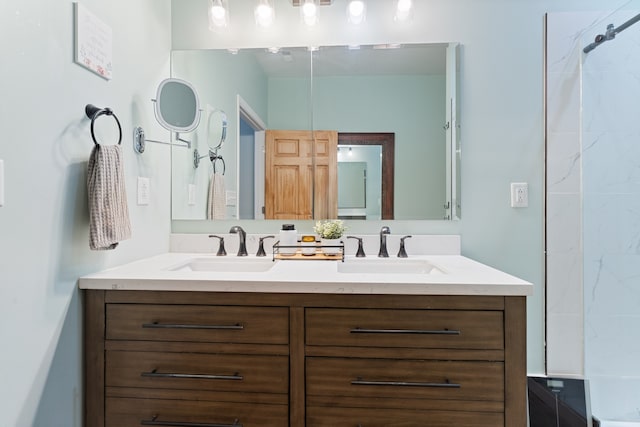 bathroom featuring dual vanity