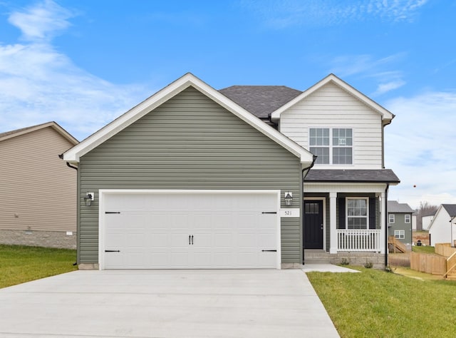 craftsman house with a front lawn, a porch, and a garage