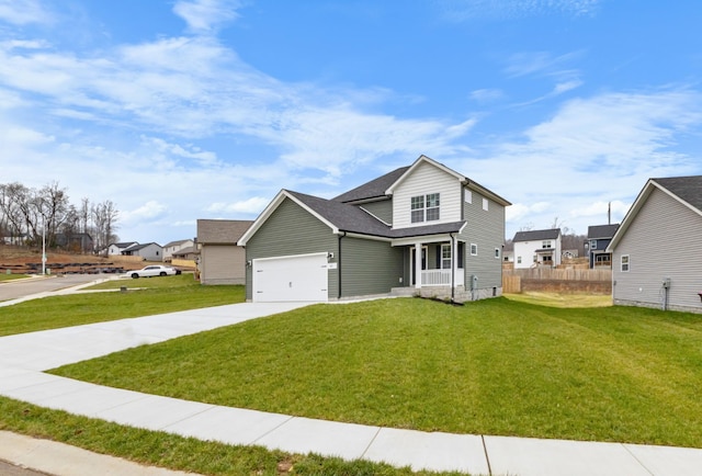 view of front of home featuring a front lawn, a porch, and a garage