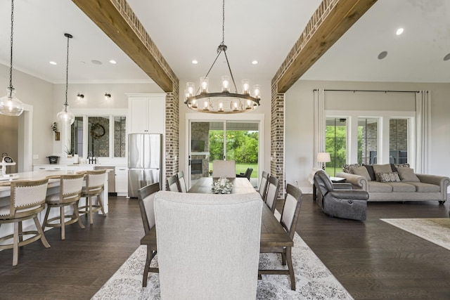 dining space featuring beamed ceiling, a healthy amount of sunlight, and dark hardwood / wood-style flooring