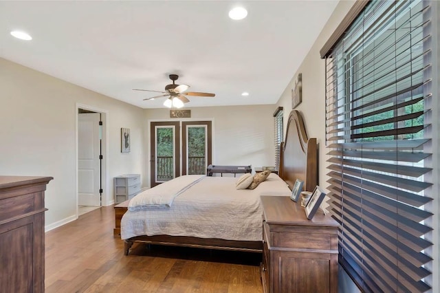 bedroom featuring ceiling fan and hardwood / wood-style floors