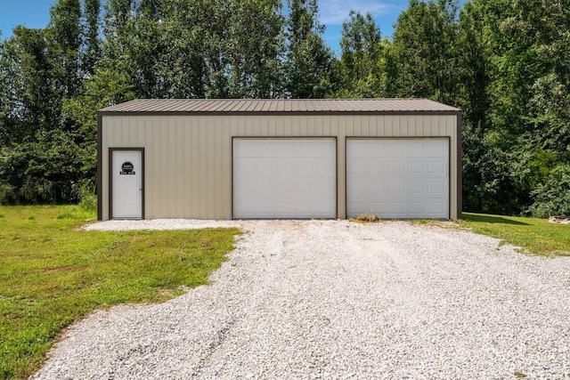 garage with a lawn