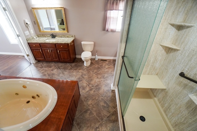 full bathroom featuring vanity, toilet, and separate shower and tub