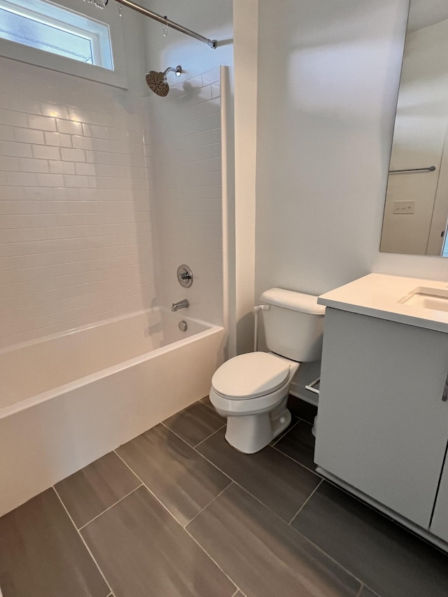 full bathroom featuring shower / washtub combination, vanity, and toilet