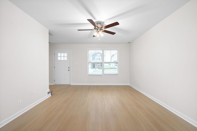 interior space with ceiling fan and light hardwood / wood-style floors