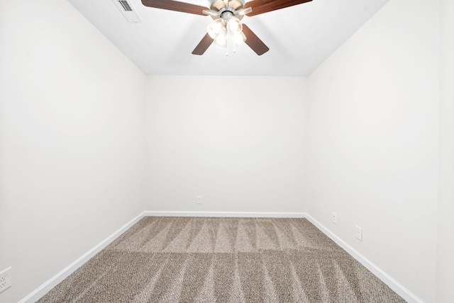 unfurnished room featuring ceiling fan and carpet flooring