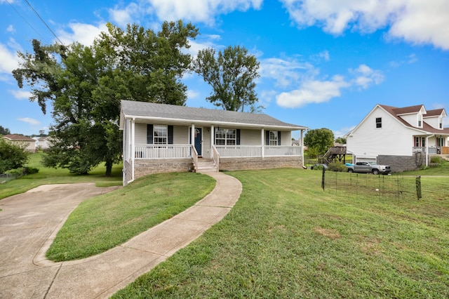 view of front of property with a porch and a front yard