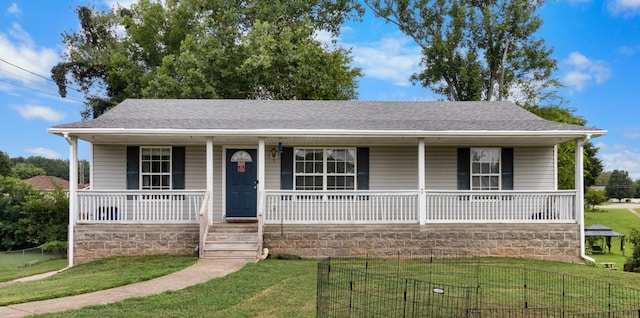 view of front of house with a front lawn and a porch