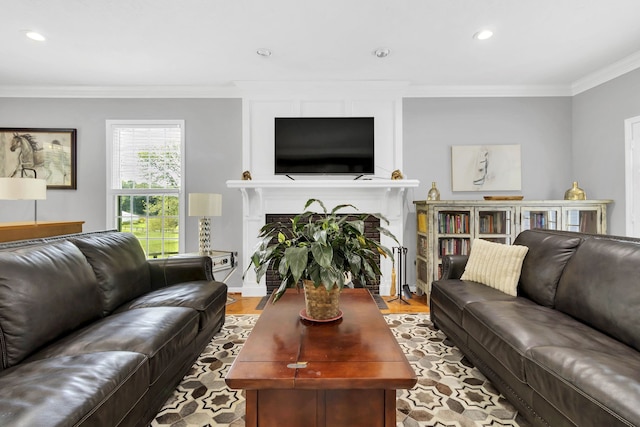 living room with ornamental molding and hardwood / wood-style flooring