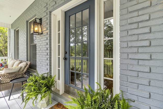 entrance to property with covered porch