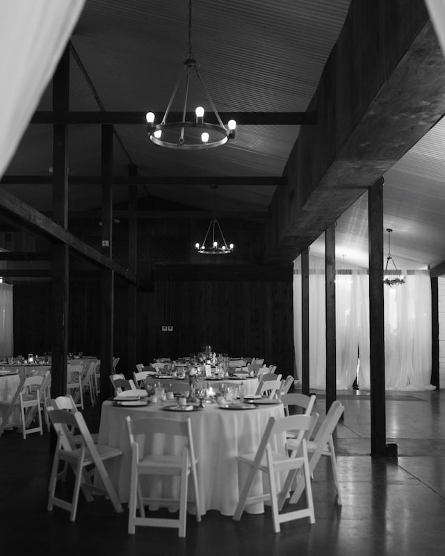 interior space featuring high vaulted ceiling and an inviting chandelier