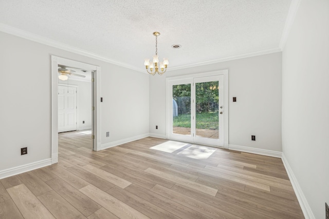 unfurnished room with light wood-style flooring, a textured ceiling, baseboards, and ornamental molding