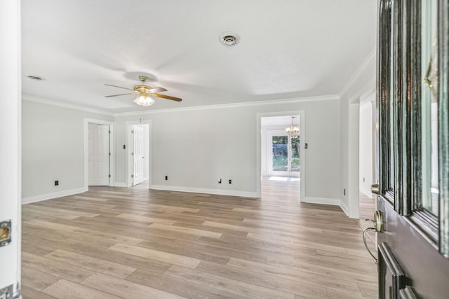 interior space with ceiling fan with notable chandelier, crown molding, baseboards, and light wood-type flooring