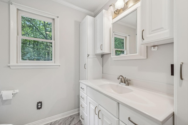 bathroom with vanity, baseboards, marble finish floor, and ornamental molding