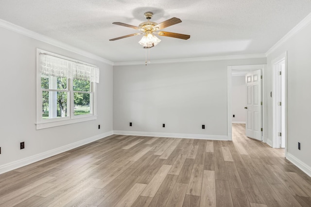 empty room featuring light wood-style flooring and crown molding