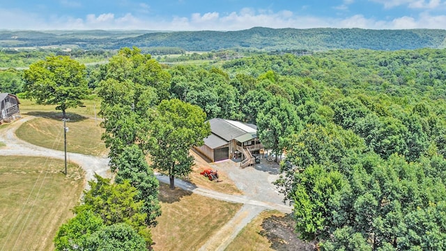 bird's eye view with a view of trees