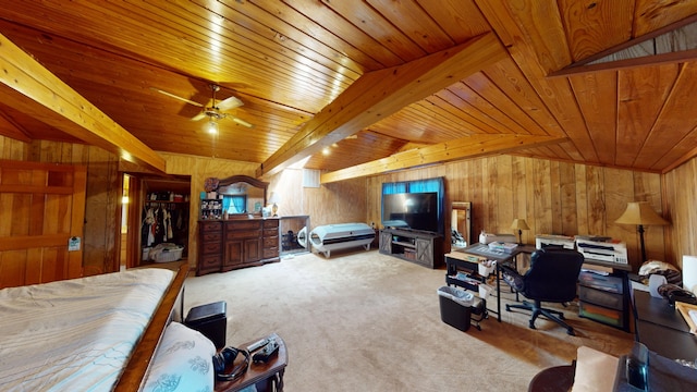 carpeted bedroom with vaulted ceiling with beams, wooden walls, and wooden ceiling