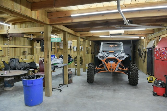 garage with wood walls