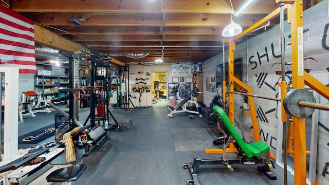 exercise room with concrete flooring