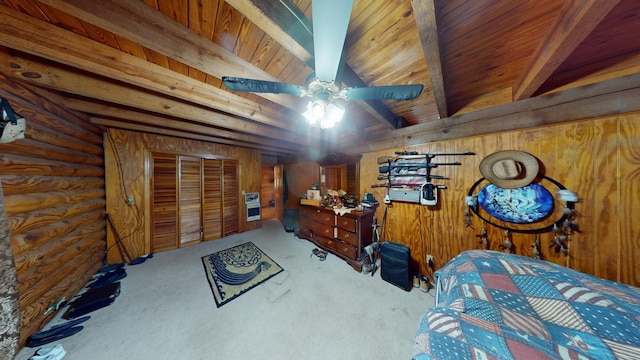 bedroom with wood ceiling, carpet, beam ceiling, and wood walls