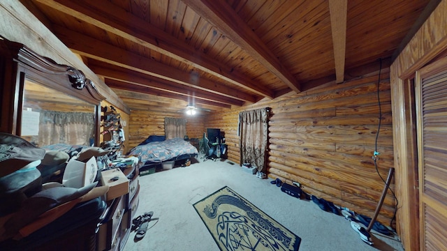 bedroom featuring carpet floors, beamed ceiling, and wood ceiling