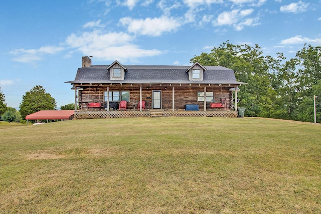 view of front of property featuring a shingled roof, a chimney, and a front yard