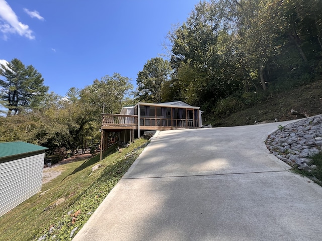 exterior space featuring a wooden deck