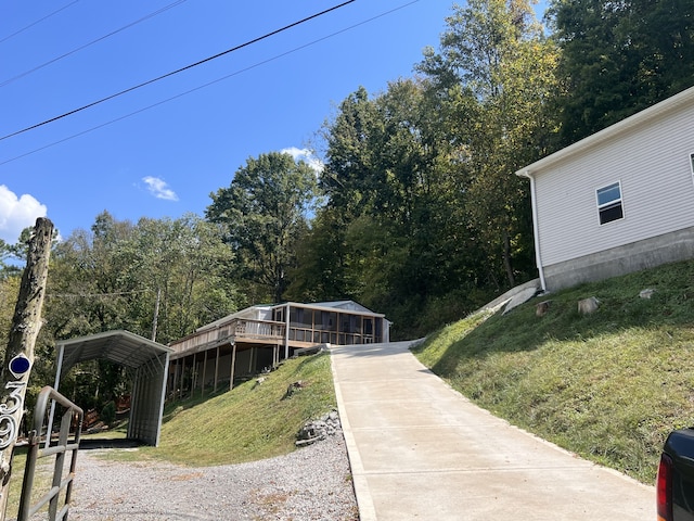 view of yard with a carport