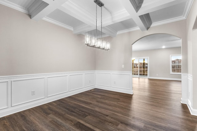 unfurnished dining area with beamed ceiling, dark hardwood / wood-style flooring, crown molding, and coffered ceiling