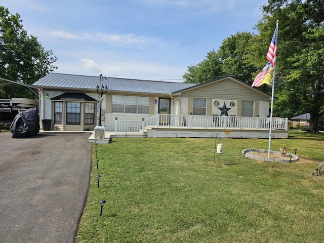 view of front of home with a front yard