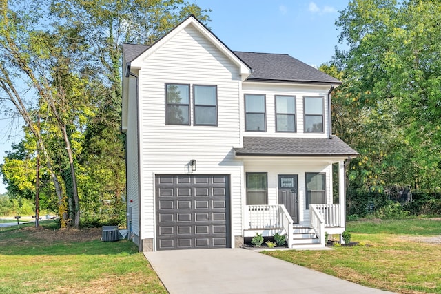 view of front of house featuring a garage, central air condition unit, covered porch, and a front lawn