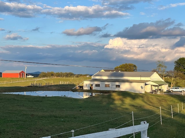 exterior space with a rural view