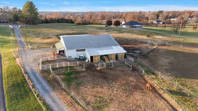 birds eye view of property featuring a rural view