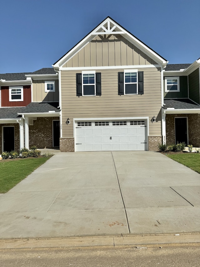 craftsman house with a garage