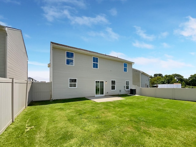 back of property featuring a patio area, central AC unit, and a lawn