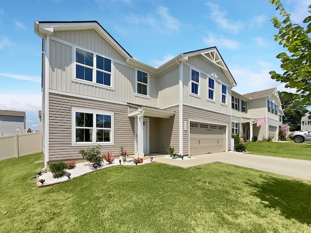 view of front of property with a garage and a front lawn