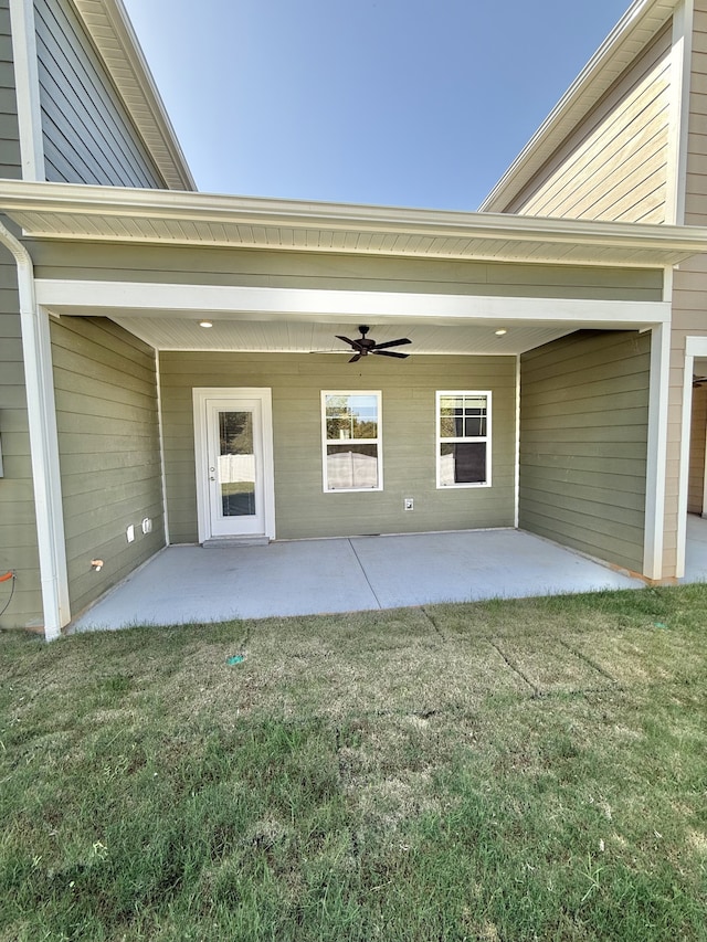 view of patio featuring ceiling fan