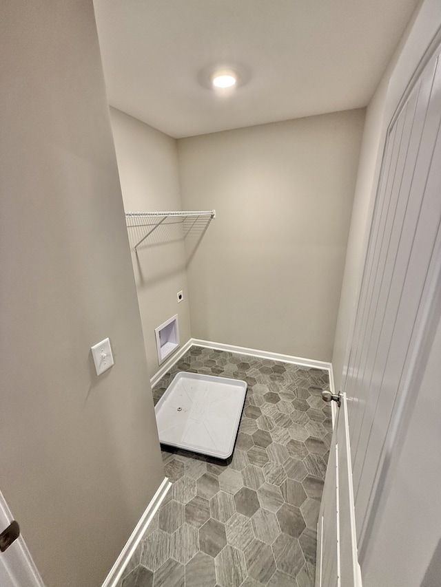 laundry room with electric dryer hookup and washer hookup