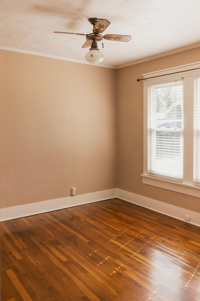 spare room featuring crown molding, ceiling fan, and hardwood / wood-style floors