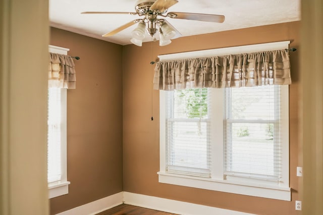 spare room with ceiling fan