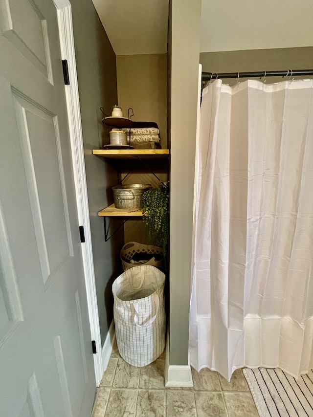 bathroom with tile patterned flooring