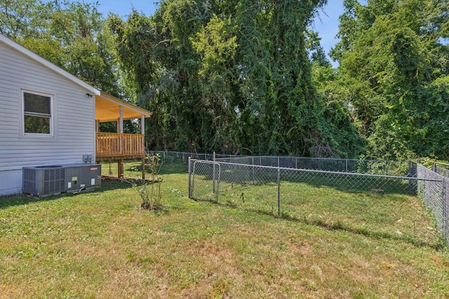 view of yard with central AC unit