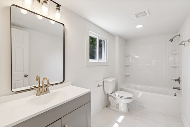 full bathroom featuring tub / shower combination, vanity, tile patterned flooring, and toilet