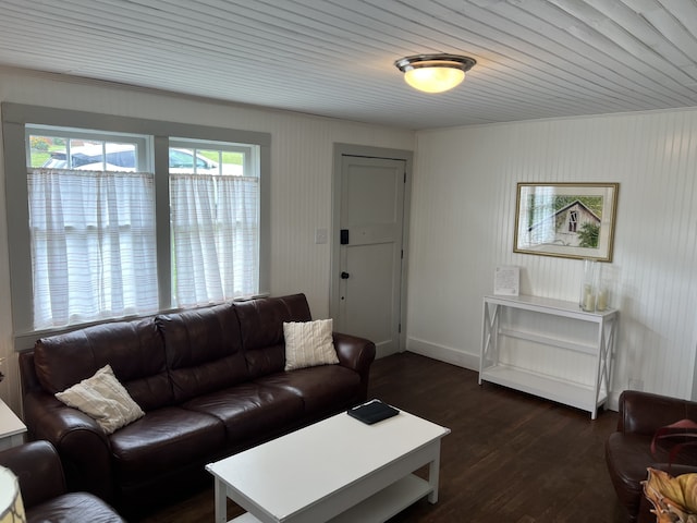 living room featuring dark hardwood / wood-style floors and wood ceiling