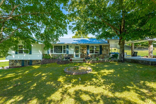 single story home featuring a front yard