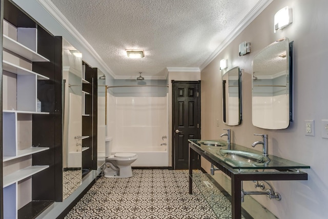 bathroom featuring crown molding, toilet, bathing tub / shower combination, and a textured ceiling