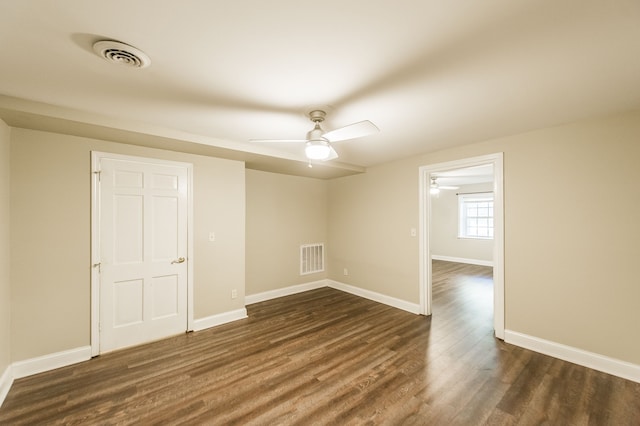 unfurnished room featuring ceiling fan and hardwood / wood-style flooring