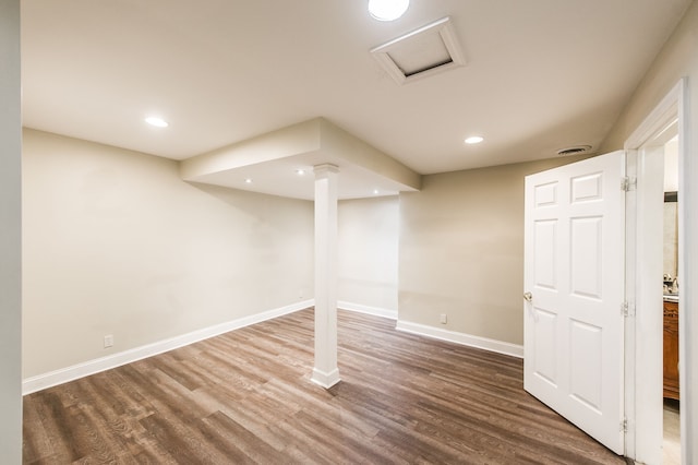 basement featuring hardwood / wood-style flooring