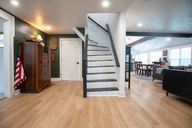 staircase featuring hardwood / wood-style flooring